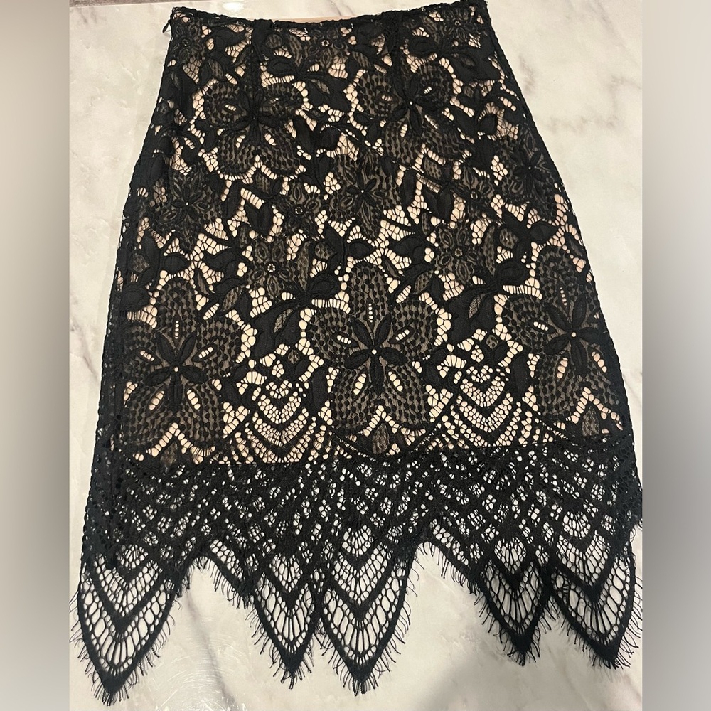 Elegant Black Lace Skirt with Cream Colored Lining
